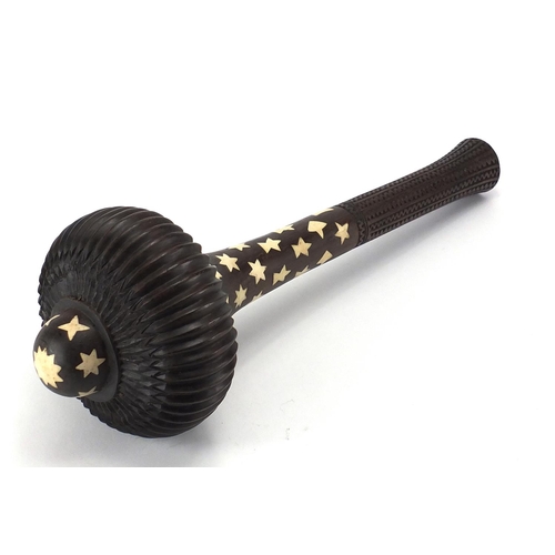 569 - Indian ceremonial ebony and ivory mace with star motifs, 47cm in length