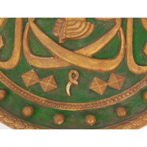 571 - Circular Turkish wooden calligraphy panel hand painted in green and gilt, 63cm in diameter