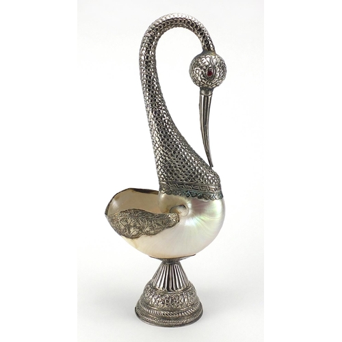 554 - Anglo Indian silver coloured metal and Nautilus shell swan sculpture, 48.5cm high