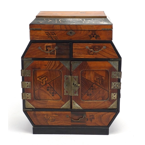 467 - Japanese lacquered table cabinet, having an inlaid geometric design, 36.5cm high