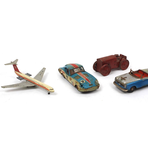 396 - Vintage and later toys including Tri-Ang tractor, Schuco 1072 racing vehicle, Japanese tin plate car... 