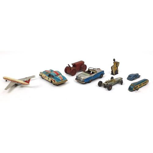 396 - Vintage and later toys including Tri-Ang tractor, Schuco 1072 racing vehicle, Japanese tin plate car... 