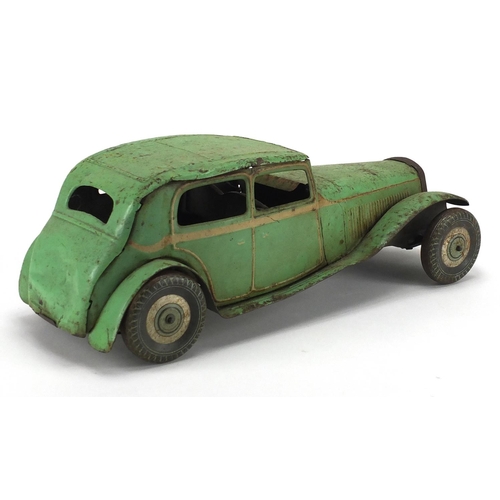 405 - English tin plate clockwork saloon car, marked made in GT Britain, 35cm in length