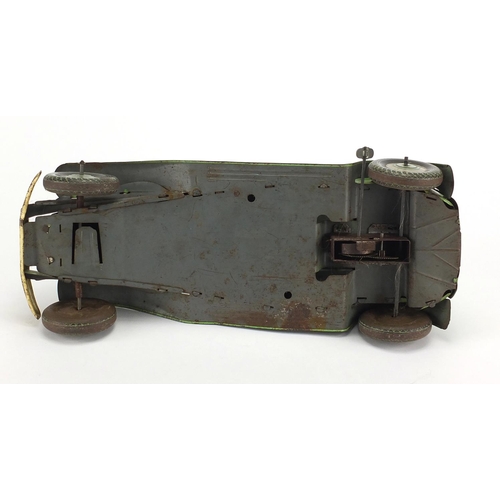 405 - English tin plate clockwork saloon car, marked made in GT Britain, 35cm in length