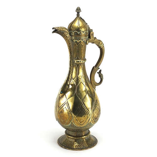 547 - Turkish jewelled copper ewer engraved with foliate motifs, set with turquoise stones, 33.5cm high