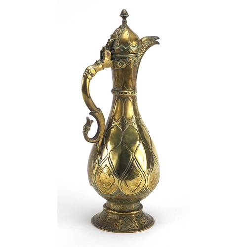 547 - Turkish jewelled copper ewer engraved with foliate motifs, set with turquoise stones, 33.5cm high