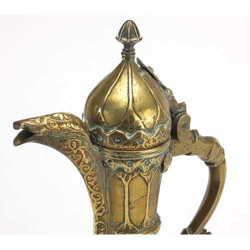 547 - Turkish jewelled copper ewer engraved with foliate motifs, set with turquoise stones, 33.5cm high