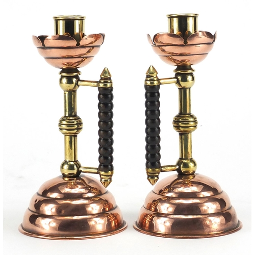 698 - Pair of Arts & Crafts Benham and Froud copper and brass candlesticks, designed by Christopher Dresse... 