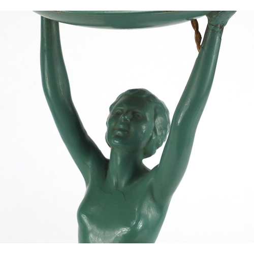 689 - Art Deco green painted figural lamp base, modelled as a nude female with her arms upwards stretched,... 