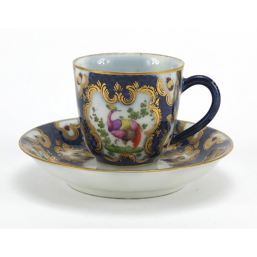 600 - 19th Century blue scale porcelain cup and saucer, hand painted with exotic birds and butterflies, bl... 