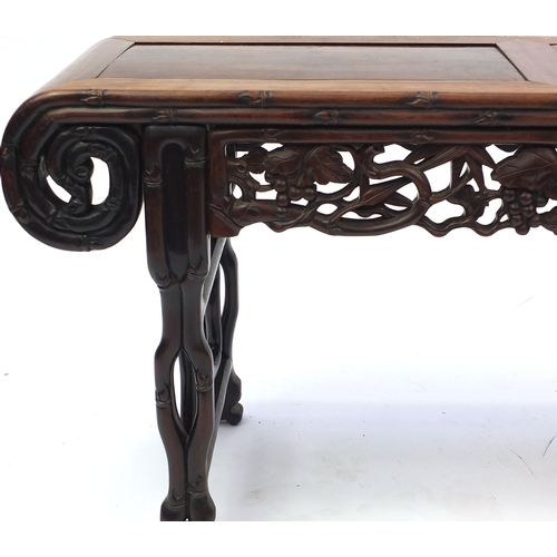 463 - Chinese rosewood hall bench, carved with foliage and berries, 53cm H x 105cm W x 34.5cm D