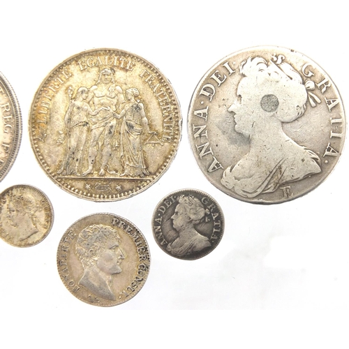 231 - Early 18th century and later British and World silver coinage comprising Queen Anne 1708 crown, Quee... 