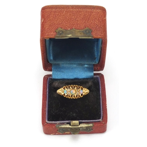 879 - 18ct gold opal and diamond ring, size O, approximate weight 2.2g