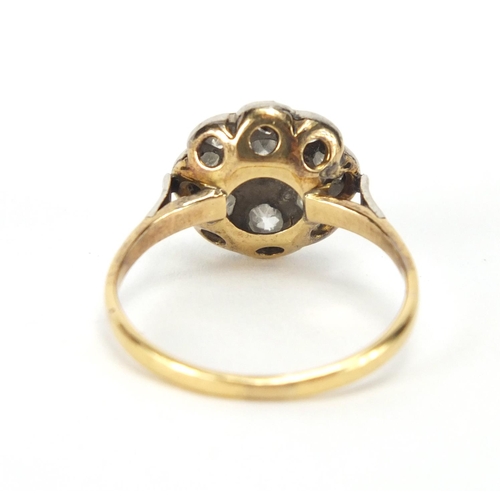 843 - Unmarked gold diamond flower head ring, size P, approximate weight 3.3g