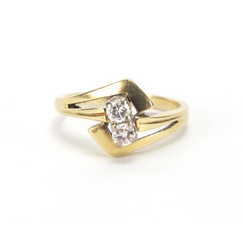 893 - 14ct gold diamond two stone crossover ring, size N, approximate weight 4.3g