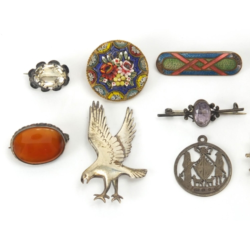 897 - Group of antique and later brooches including Scottish examples, an eagle, micro mosaic and enamel, ... 