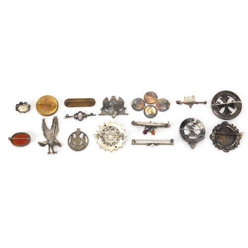 897 - Group of antique and later brooches including Scottish examples, an eagle, micro mosaic and enamel, ... 