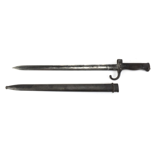 343 - Military interest bayonet and scabbard with triangular steel blade, various impressed marks, 56cm in... 