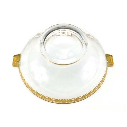 633 - Good quality Art Deco clear cut glass fruit bowl with stylised twin handles, etched and decorated in... 