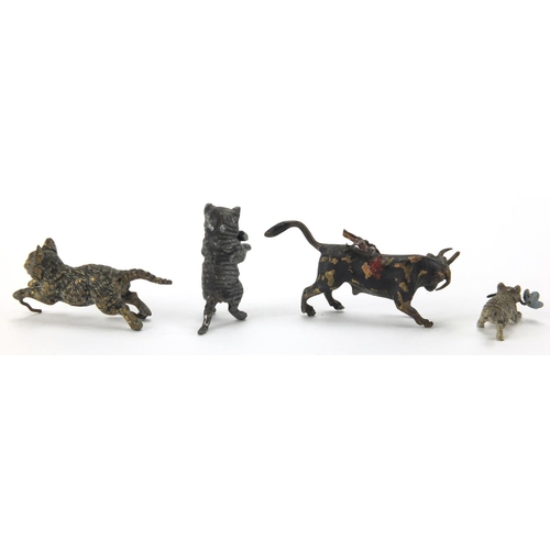 92 - Four Austrian cold painted bronze animals comprising three cats and a bull, the largest 3cm high