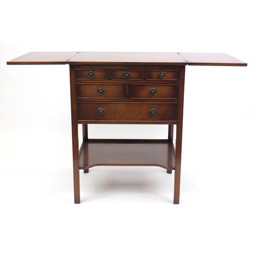 2009 - Mahogany serving table fitted with a folding top above a series of four drawers and an under tier, 8... 