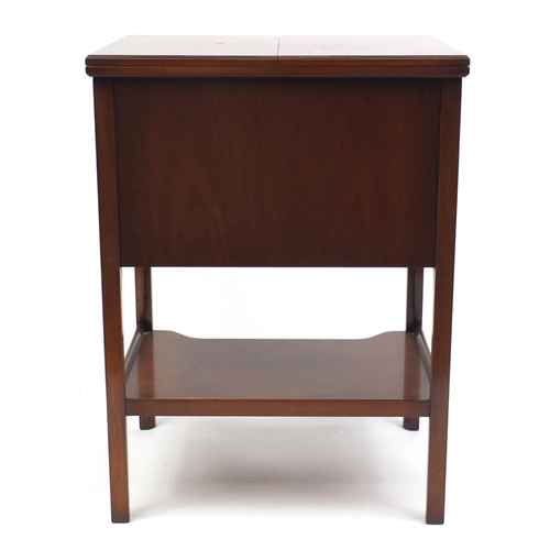 2009 - Mahogany serving table fitted with a folding top above a series of four drawers and an under tier, 8... 