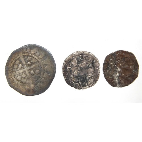 217 - Eleven hammered silver coins including six pence, three pence and pennies, approximate weight 13.4g