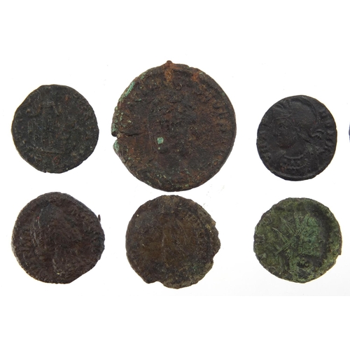 259 - Elven Roman coins including a silver example, approximate weight 34.1g