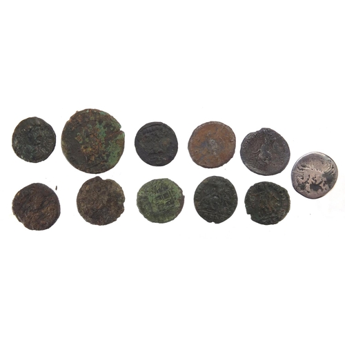 259 - Elven Roman coins including a silver example, approximate weight 34.1g