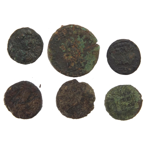 259 - Elven Roman coins including a silver example, approximate weight 34.1g