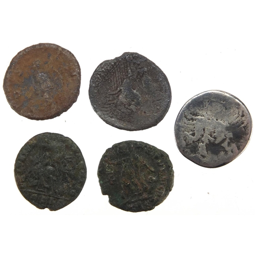 259 - Elven Roman coins including a silver example, approximate weight 34.1g