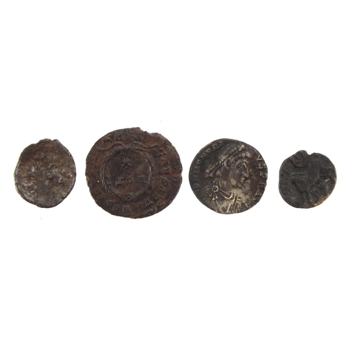 257 - Four Roman coins including three silver, approximate weight 5.7g