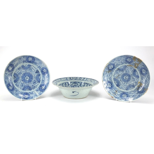 447 - Two Chinese blue and white porcelain dishes together with a similar basin, all hand painted with flo... 