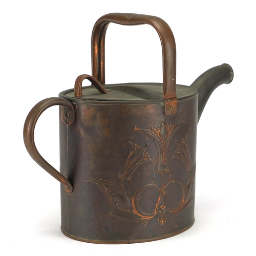 703 - Arts & Crafts copper watering can embossed with stylised flowers, impressed J S & S marks and regist... 