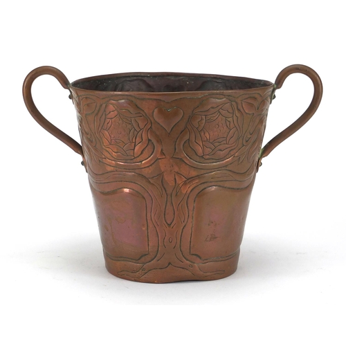 702 - Arts & Crafts copper ice bucket with twin handles, embossed with the tree of life, 16.5cm high