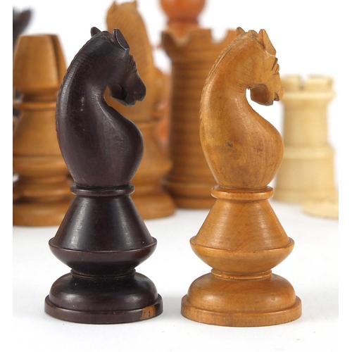 386 - Miscellaneous chess pieces including bone and boxwood examples, some stained, together with a draugh... 