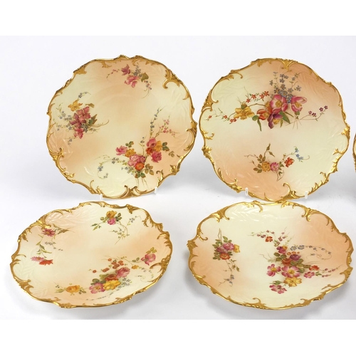 607 - Set of six Victorian Royal Worcester blush ivory porcelain plates with gilt borders, each decorated ... 