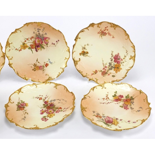 607 - Set of six Victorian Royal Worcester blush ivory porcelain plates with gilt borders, each decorated ... 