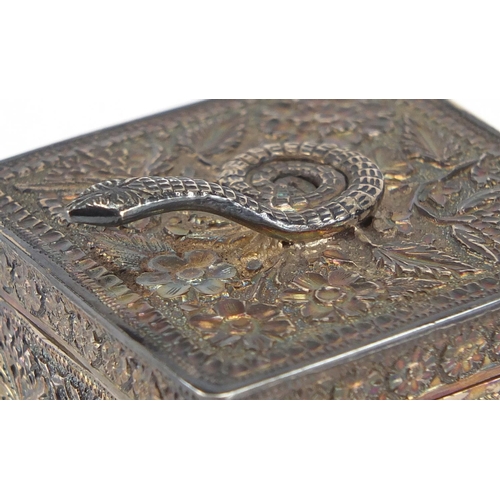 732 - Good quality unmarked Indian silver square box and cover, the hinged lid mounted with a serpent, emb... 