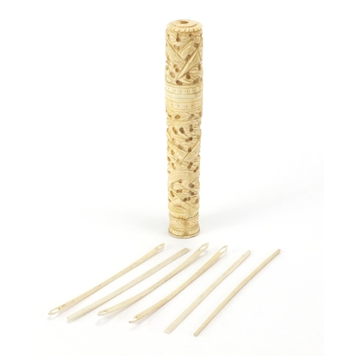 515 - Chinese Canton ivory cylindrical needle case carved with a dragon and birds of paradise, 15cm high