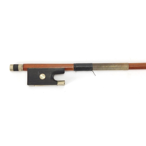 281 - Violin bow with Mother of pearl frog, impressed Grandino, 74cm in length, approximate weight 54.8g