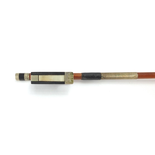 281 - Violin bow with Mother of pearl frog, impressed Grandino, 74cm in length, approximate weight 54.8g