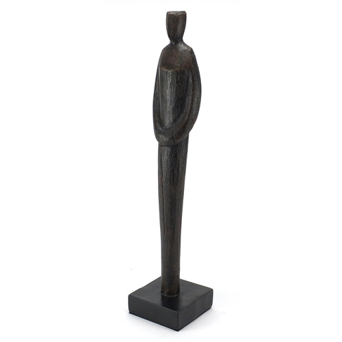 2056 - Modernist figural sculpture on square black base, bearing a gallery label to the base, overall 48cm ... 