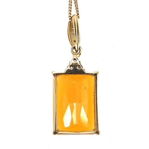 841 - 9ct gold fire opal and diamond pendant on a 9ct gold necklace, the pendant 3.5cm in length, approxim... 