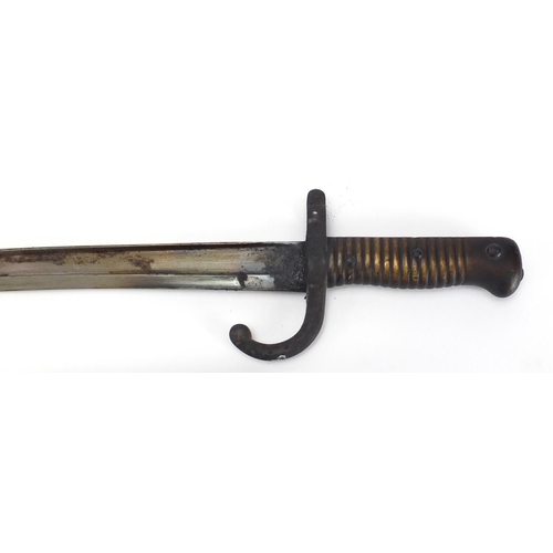 341 - 19th century French Military St Etienne long bayonet and scabbard, numbered 902, 71cm in length