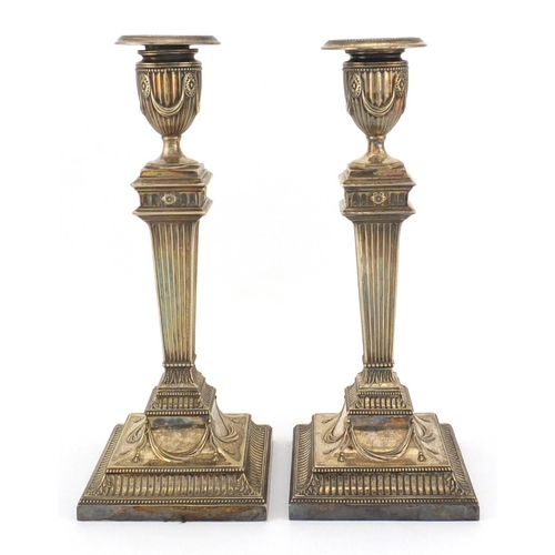 792 - Pair of silver plated candlestick modelled as Campana urns on stands, H E & Co, 27.5cm high