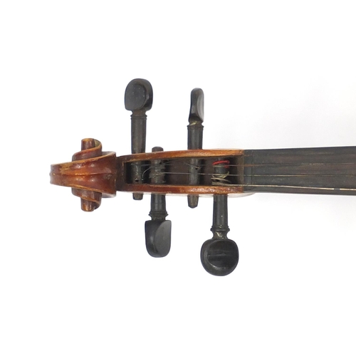 277 - Old wooden violin with scrolled neck, bearing a Mordoch & Co of London label to the interior, the vi... 