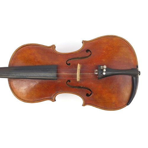 277 - Old wooden violin with scrolled neck, bearing a Mordoch & Co of London label to the interior, the vi... 