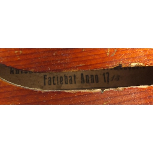 277 - Old wooden violin with scrolled neck, bearing a Mordoch & Co of London label to the interior, the vi... 