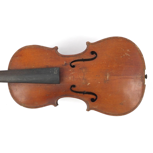 277 - Old wooden violin with scrolled neck, bearing a Mordoch & Co of London label to the interior, the vi... 